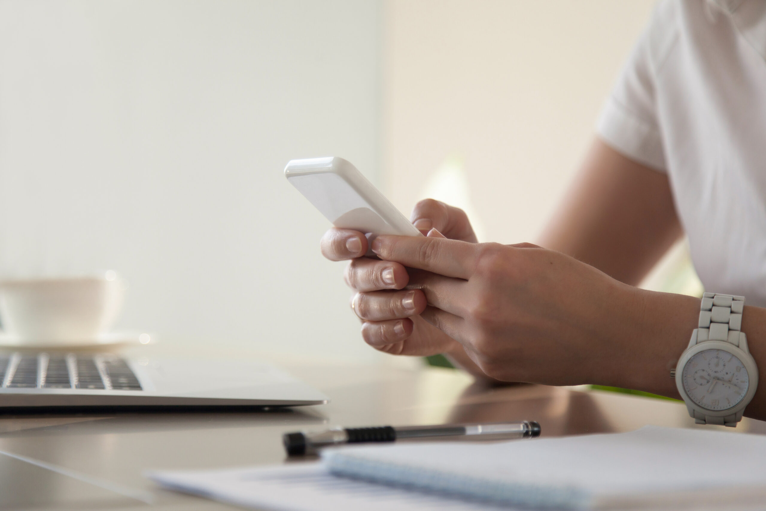 businesswoman-looking-important-contact-phone-scaled.jpg